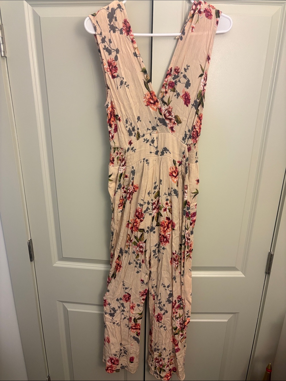 ILLA ILLA Blush Floral V-Neck Jumpsuit with Red & Green Accents